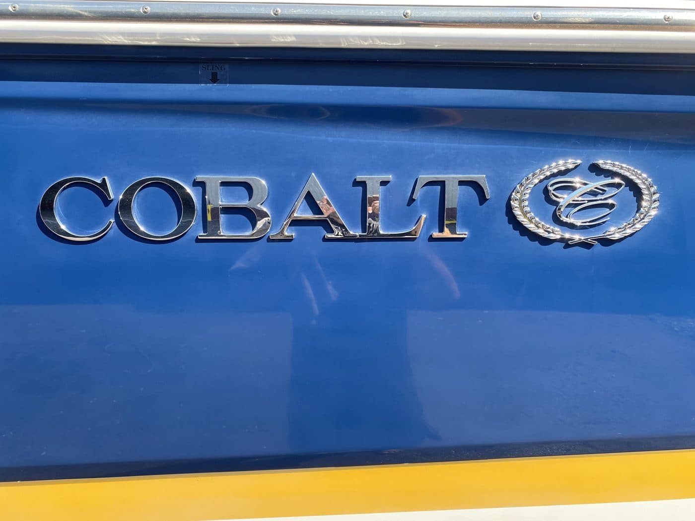 The same badge and gelcoat, deep and glossy