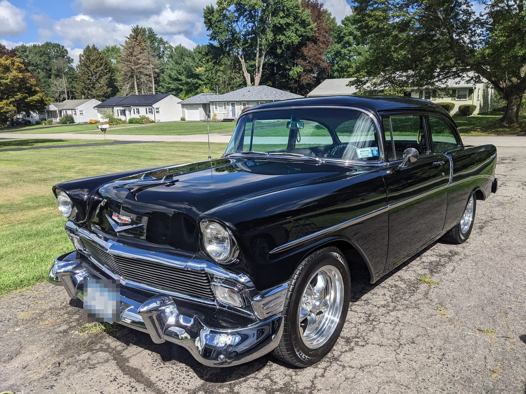 Black 1956 Chevrolet with polished chrome