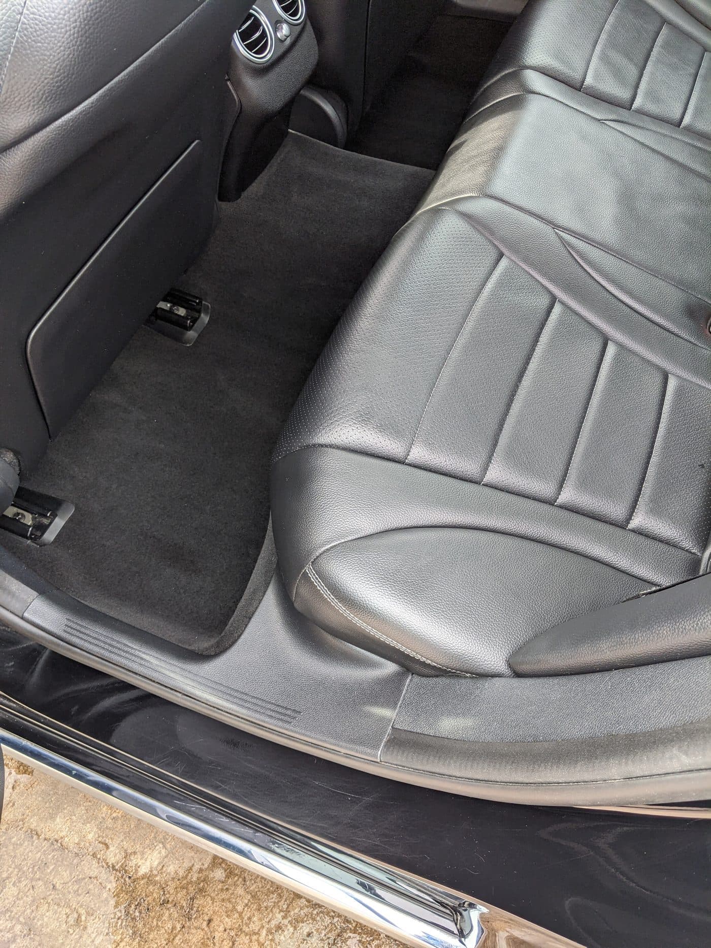 The same rear footwell and seat, clean