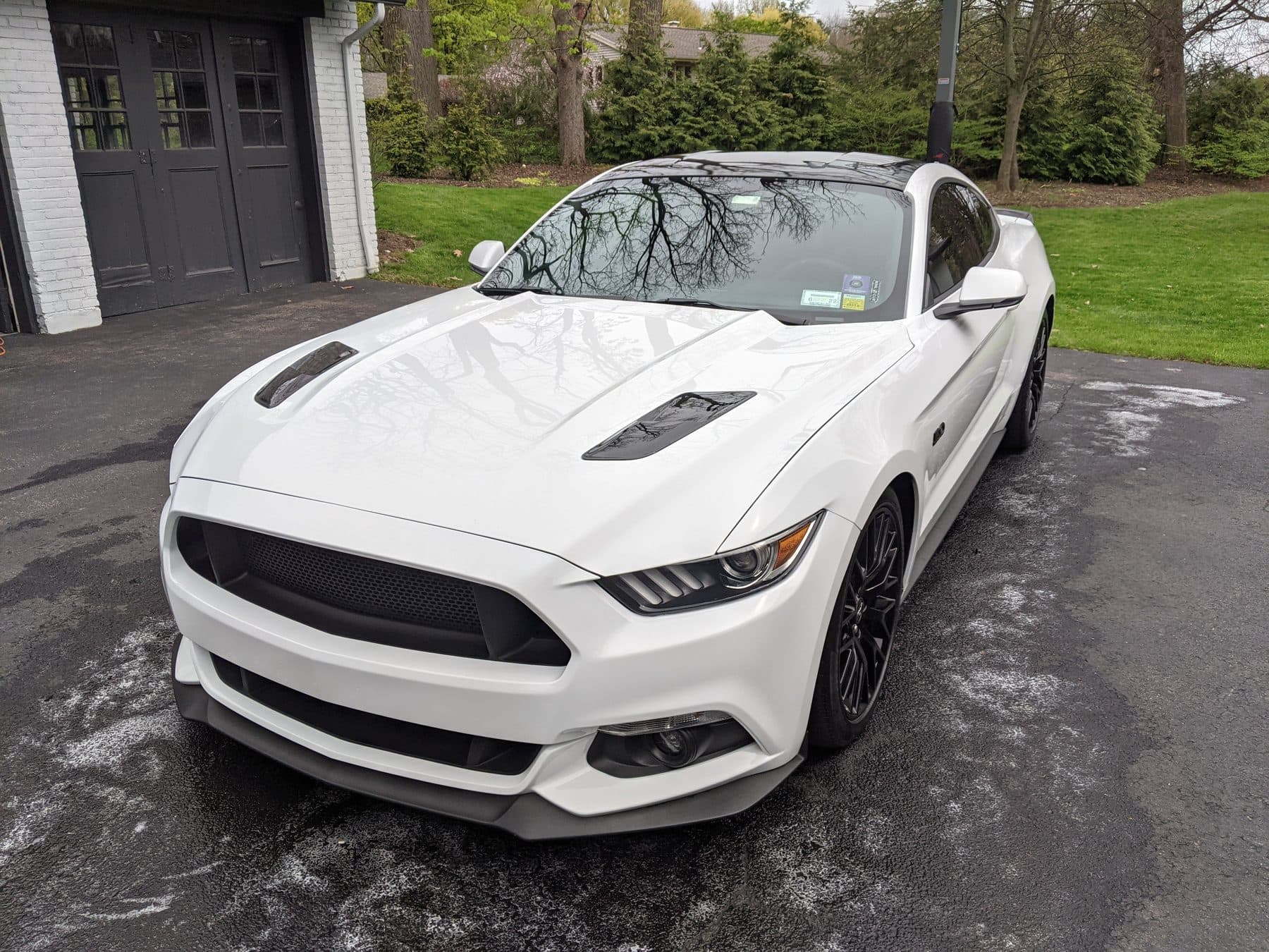 White Mustang GT clean in a driveway