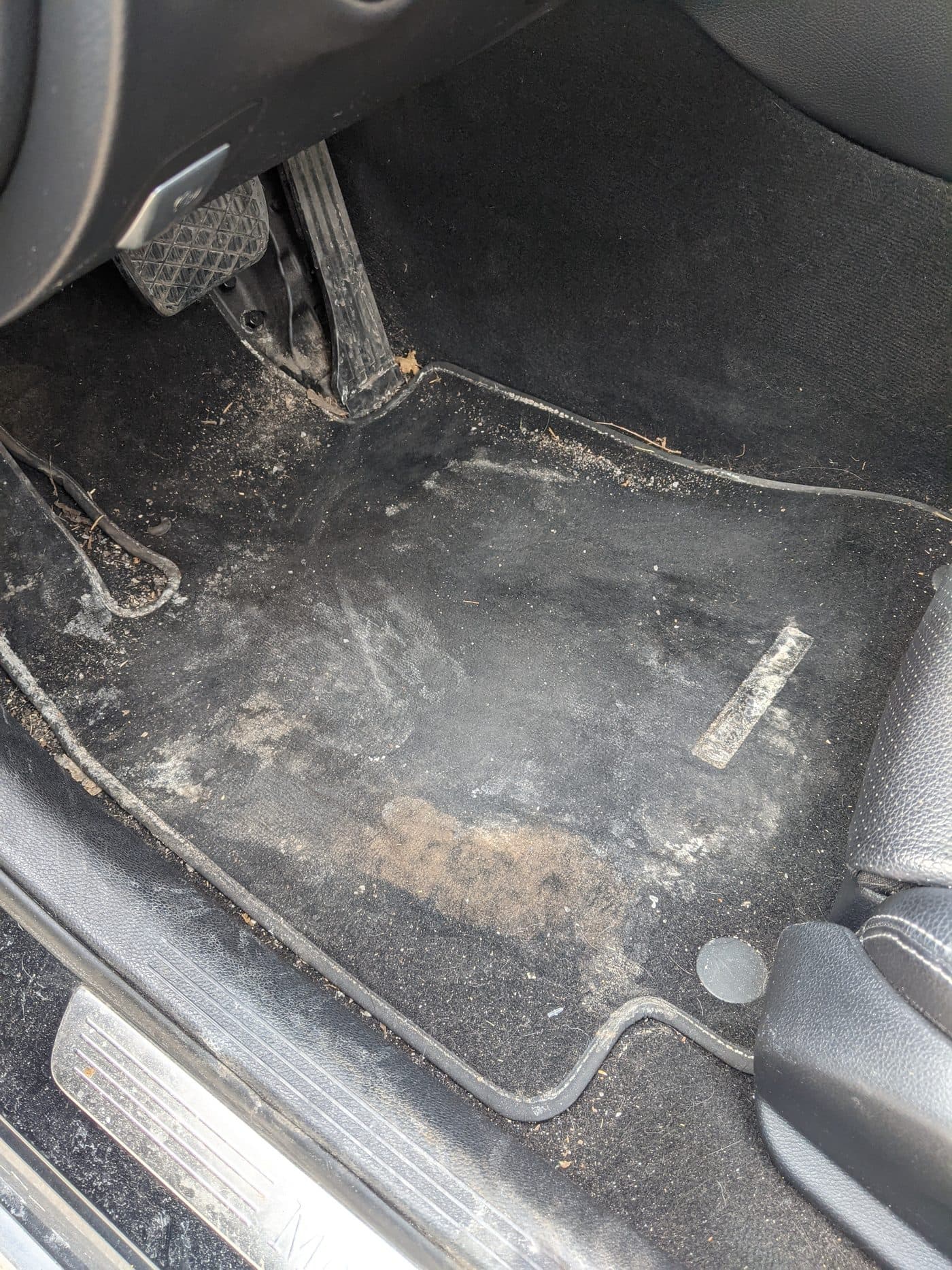 Carpet stained white with dried road salt